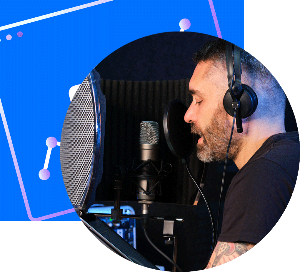 a man speaking into a microphone in a studio